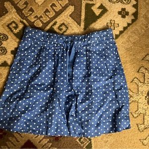 J. Crew blue and white polka dot mini skirt with tie waist.